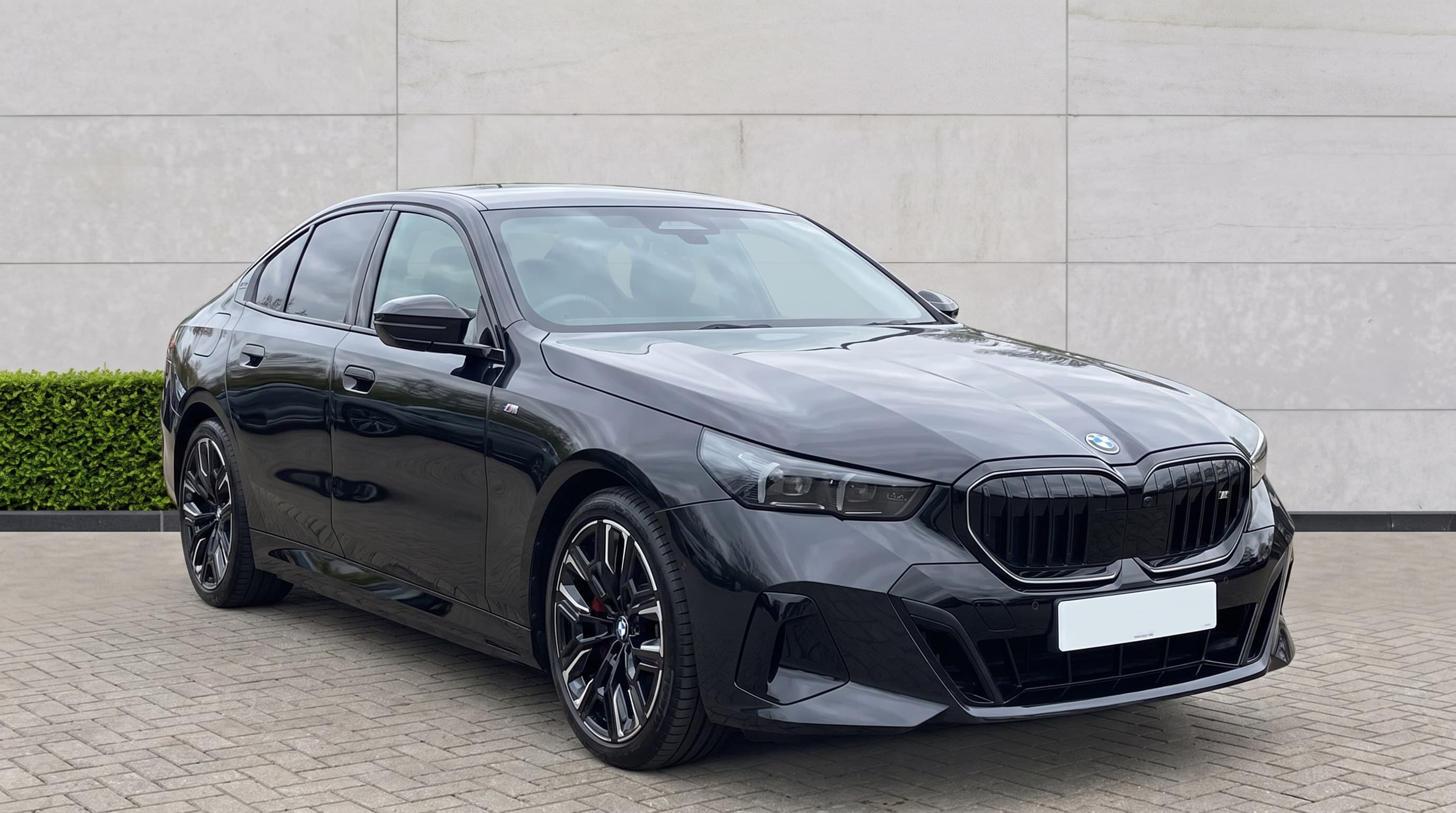 Black BMW i5 electric chauffeur car