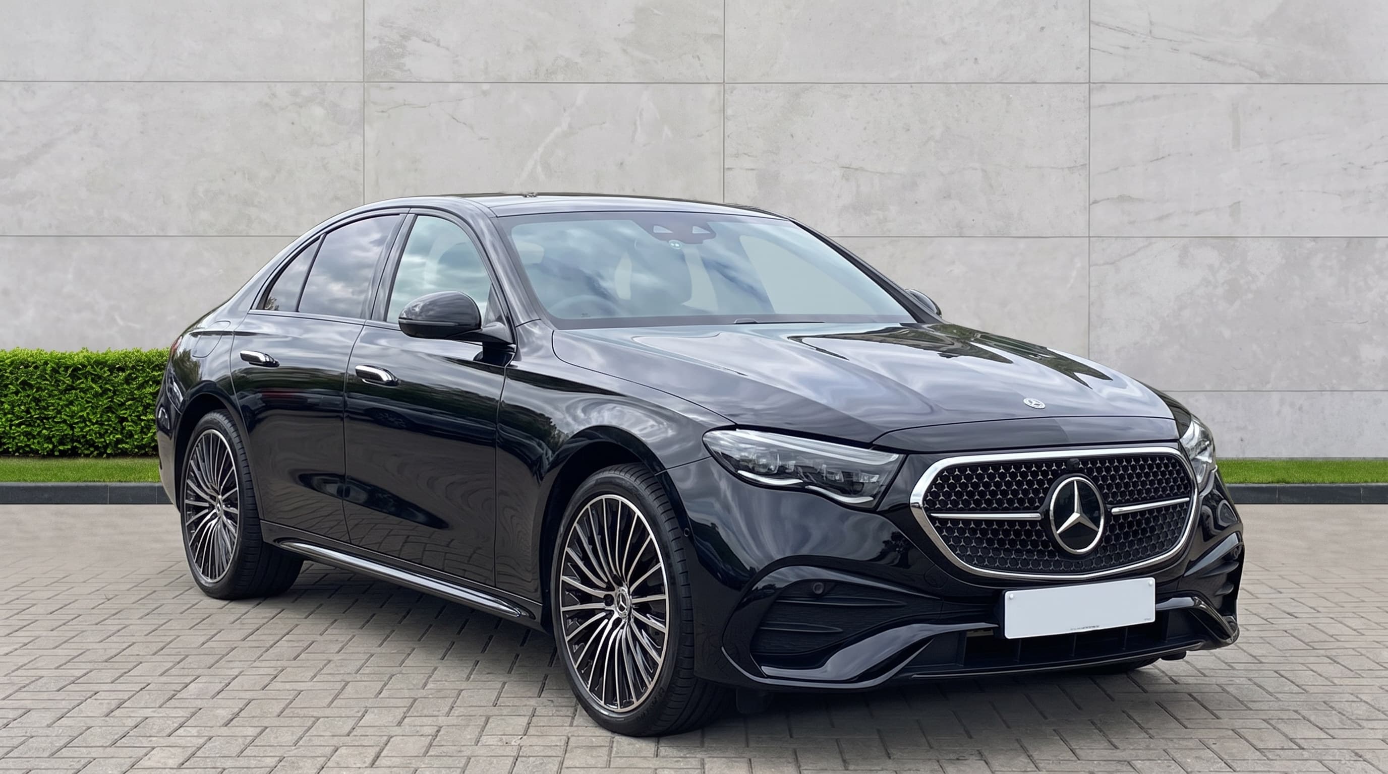 Black Mercedes-Benz E-Class chauffeur car