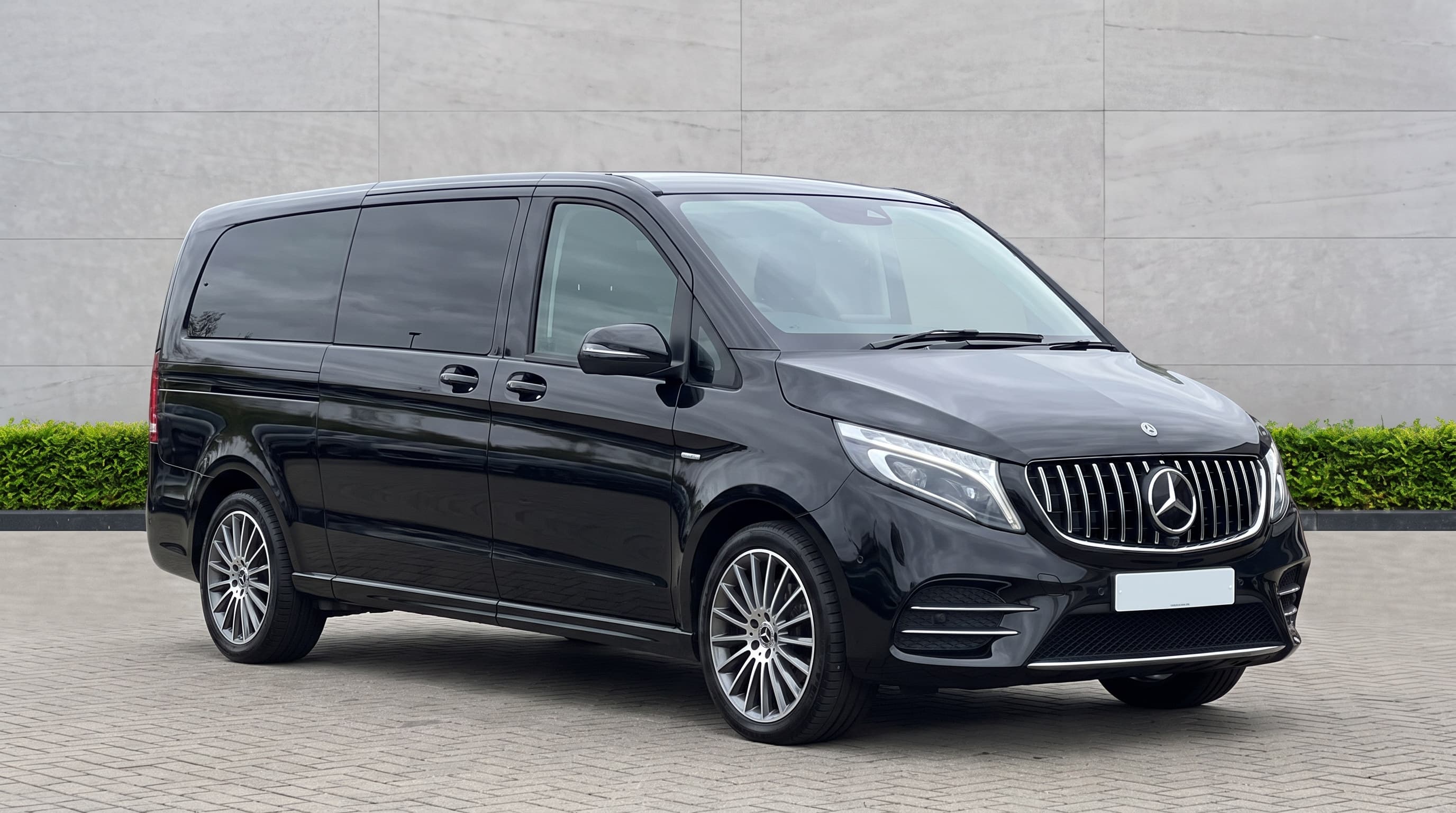 Black Mercedes-Benz V-Class people carrier